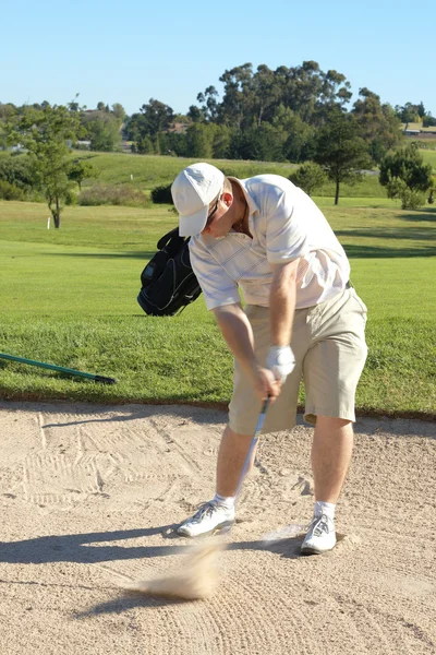 Golfer in the sand bunker — Stock Photo, Image