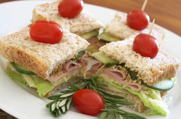 Tasty club sandwich on wholewheat bread — Stock Photo, Image
