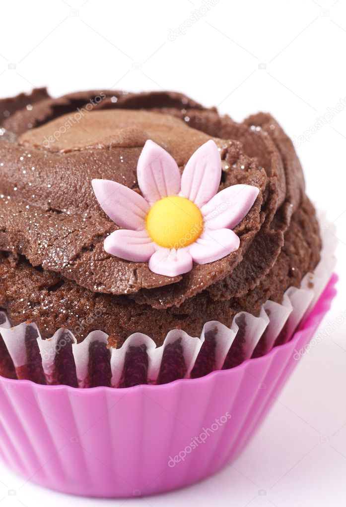 Miniature chocolate cupcake with flower