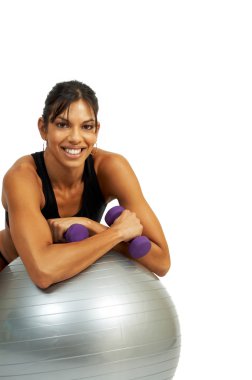 Beautiful brunette woman exercising clipart