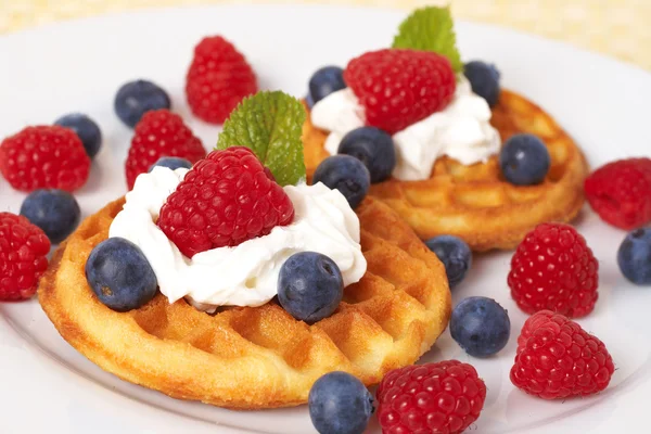 Belgian waffles with berries and cream — Stock Photo, Image