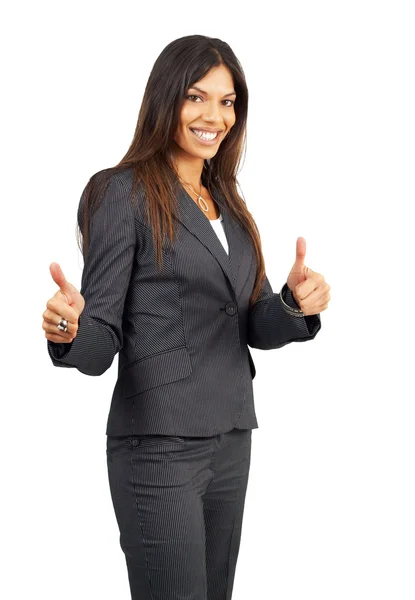 Beautiful brunette businesswoman giving thumbs up — Stock Photo, Image