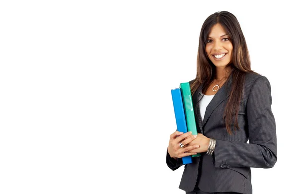 Beautiful brunette businesswoman holding files — Stock Photo, Image