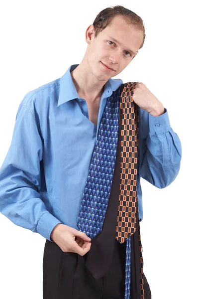 Businessman choosing a tie — Stock Photo, Image