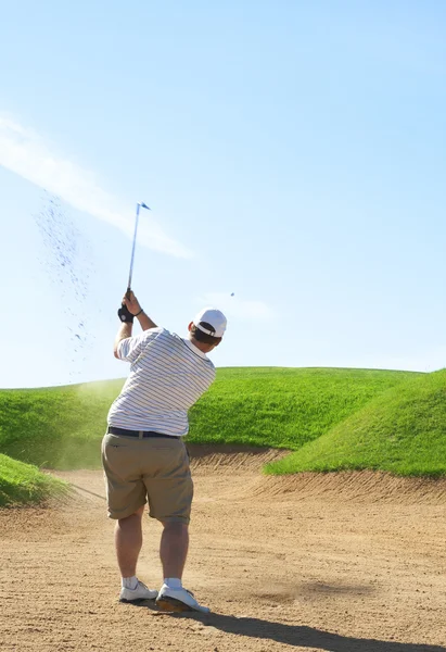 Golfer in the sand bunker — Stock Photo, Image