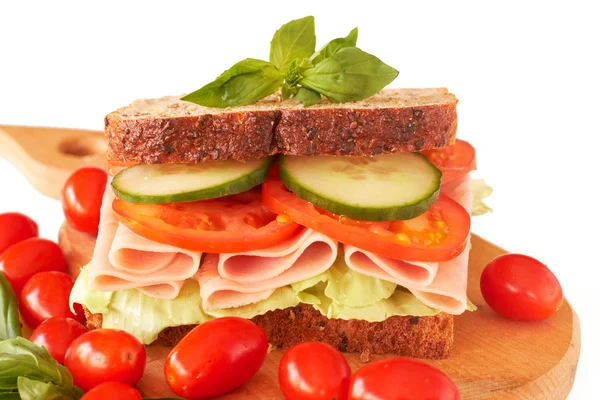 Tasty ham, tomato and cucumber sandwich — Stock Photo, Image