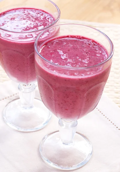 stock image Two glasses of fresh berry smoothies