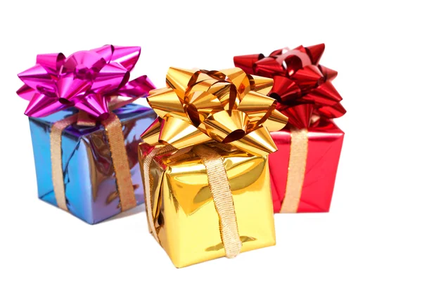 Drei Geschenkboxen mit Schleife — Stockfoto