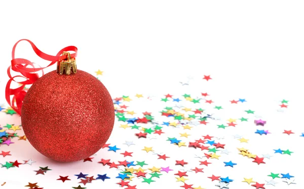 Red Christmas bauble with stars — Stock Photo, Image
