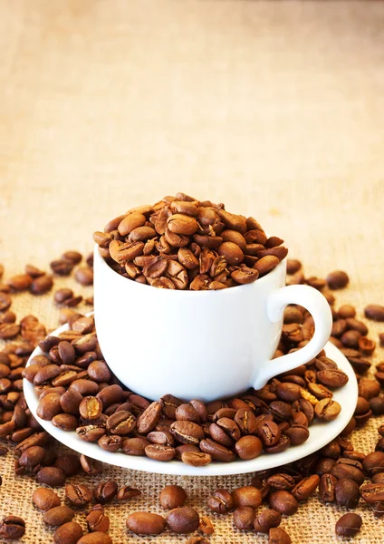 Cup filled with coffee beans — Stock Photo, Image