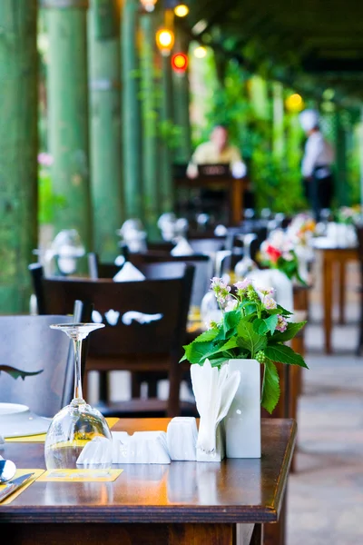 stock image The served tables on a summer verandah