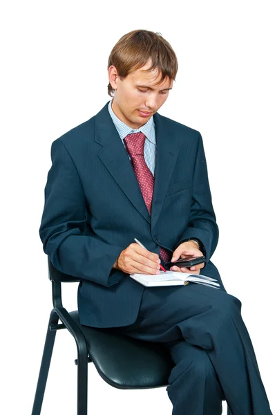 The businessman with a notebook — Stock Photo, Image