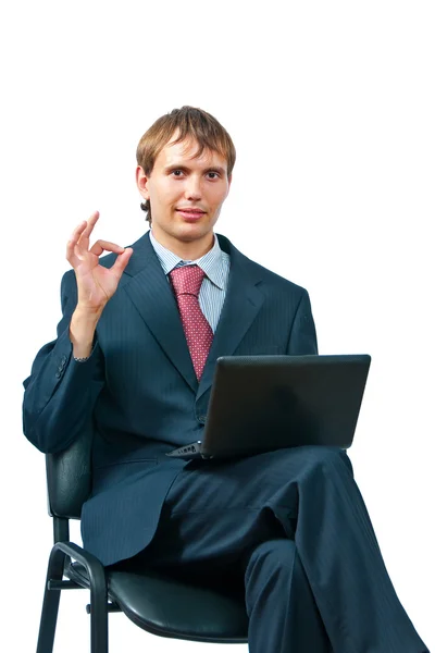 De zakenman met het oogmerk laptop — Stockfoto