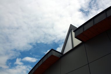 Detail of modern roof with acute windows