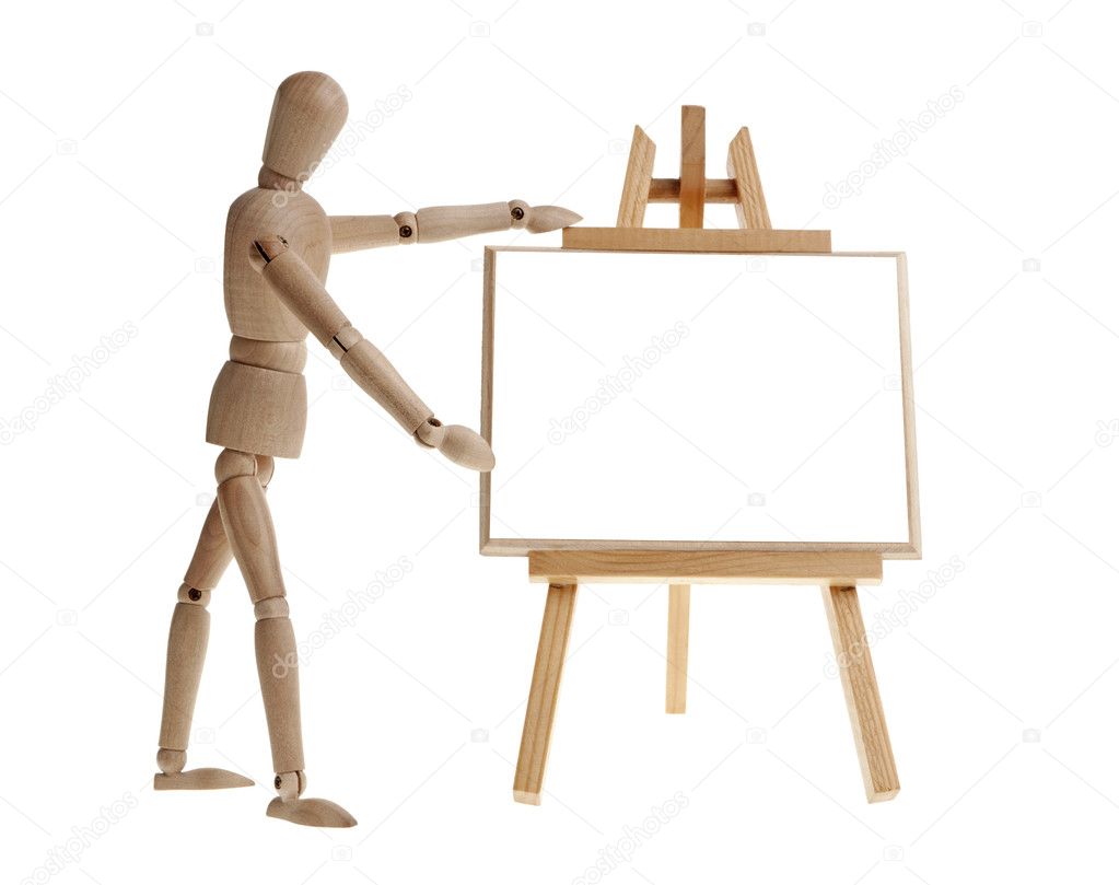 Wooden man pointing to easel.