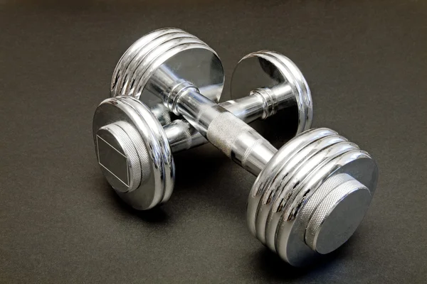 stock image Barbell weights as a fitness tool ready for use