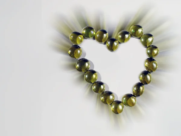 Bir kalp oluşturan kristal Altın toplar — Stok fotoğraf