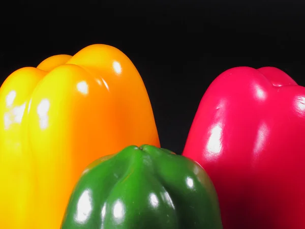 stock image Three peppers of different colors