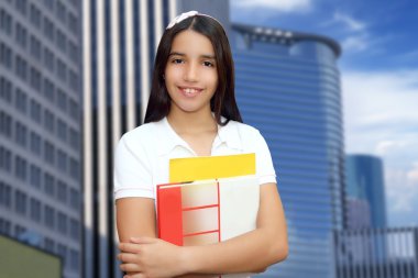 Brunette student young girl teen latin holding books clipart