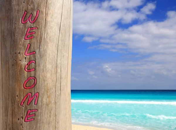 Caribbean beach spell welcome written in pole — Stock Photo, Image