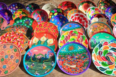 Clay ceramic plates from Mexico colorful clipart