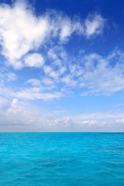 Caribbean sea horizon blue sky clouds Mexico clipart