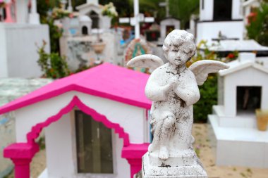 Caribbean cemetery catholic angel saints figures