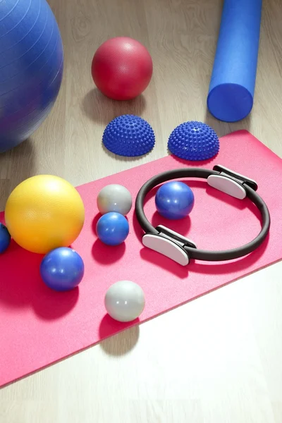 Balls pilates toning stability ring roller yoga mat Royalty Free Stock Images