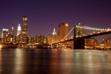 New York - Manhattan Skyline by night clipart