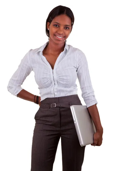 Joven mujer afroamericana sosteniendo un portátil — Foto de Stock