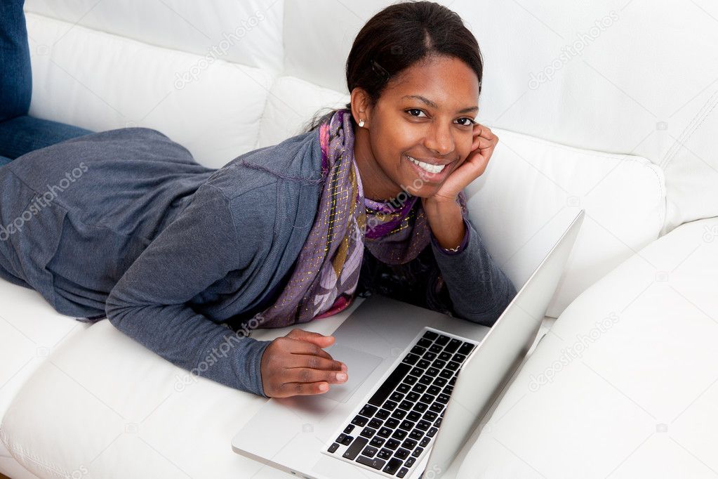 depositphotos_5141325 stock photo young black woman using a