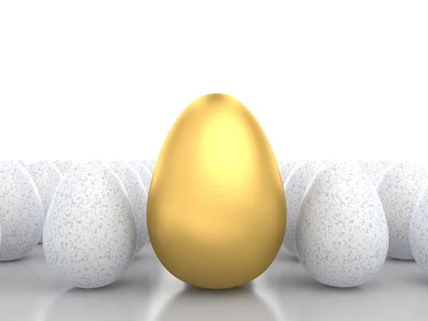 Beyaz arasında altın yumurta — Stok fotoğraf