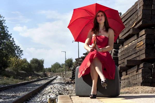 Beautiful woman with umbrella — Stock Photo, Image