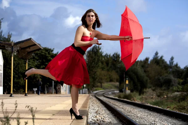 stock image Beautiful woman with umbrella