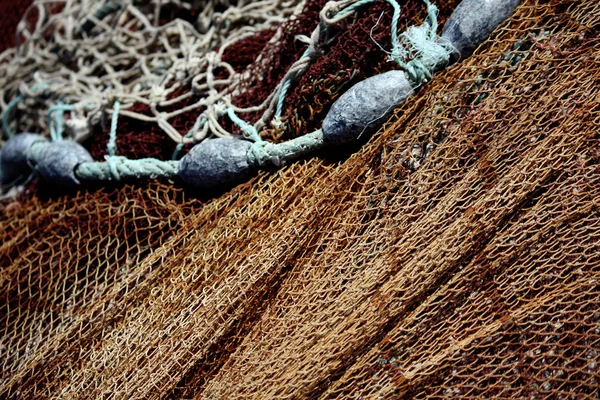 Fishing net and weights — Stock Photo, Image