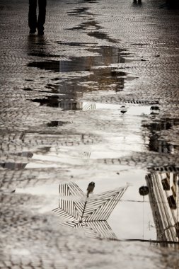 Water reflection on the street clipart