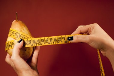 Pear with measuring tape clipart