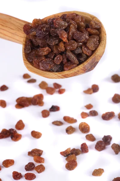 Cuillère avec raisins secs — Photo