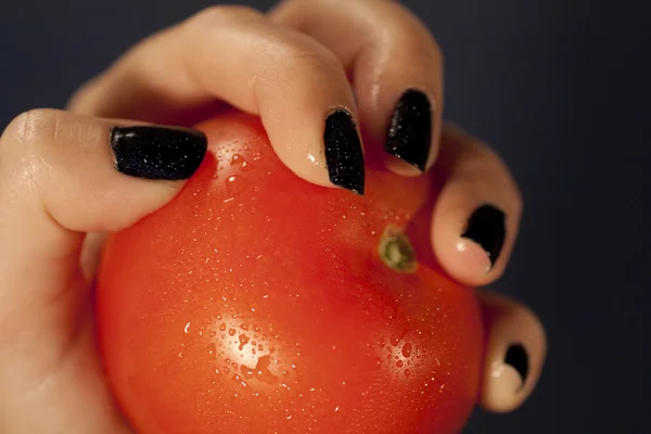 stock image Holding a tomatoe