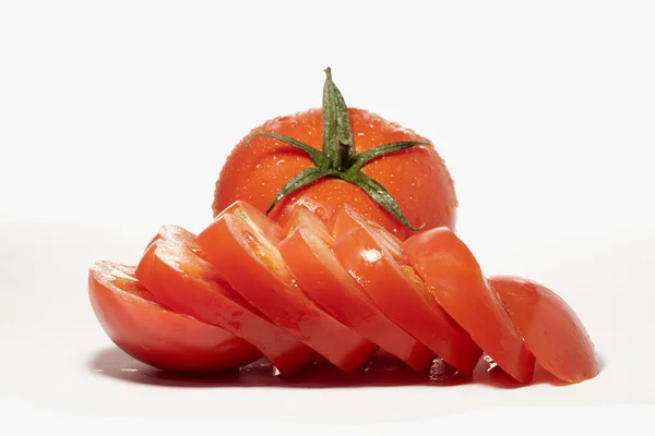 Красные томаты — стоковое фото