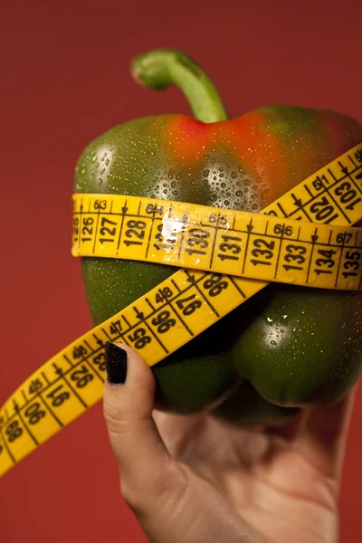 stock image Woman hand with bell pepper