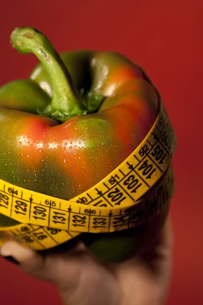 Stock image Woman hand with bell pepper