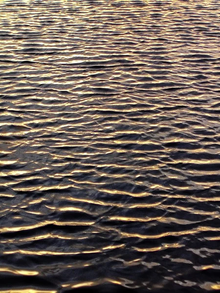 Waves on gold — Stock Photo, Image