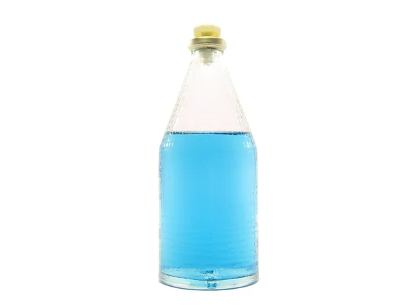 Синяя бутылка духов — стоковое фото