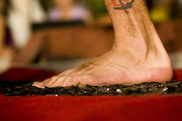 Foot on top of glass — Stock Photo, Image