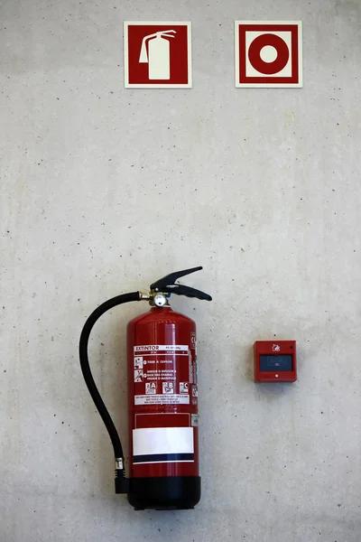 Extinguisher on the wall — Stock Photo, Image