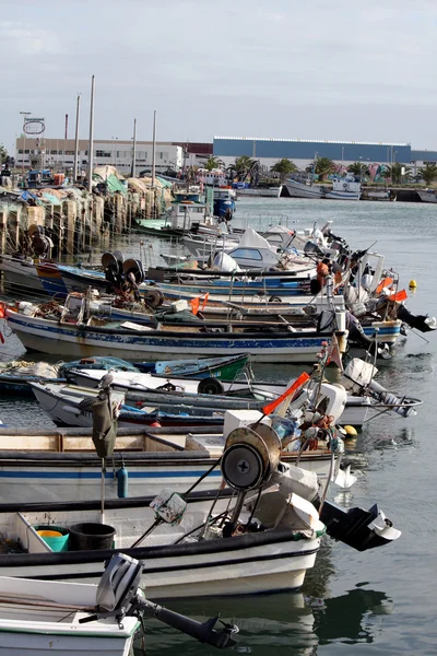 Fishing boats on docks — Stock Photo, Image
