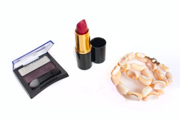 Cosmetics and coral chaplet — Stock Photo, Image