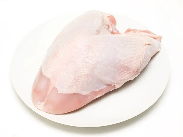 stock image Fresh turkey crown ready to cook on a plate