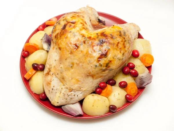 Turkey crown with stuffing, cranberries and vegetables — Stock Photo, Image